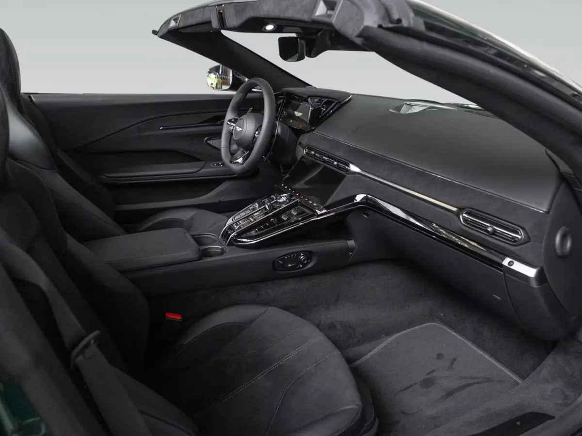 Aston Martin Vantage V8 Spider 2026, exterior — Veyra Cars, Europe. The 2026 Aston Martin Vantage V8 Spider pairs a 665 hp V8 with an open cockpit built for…