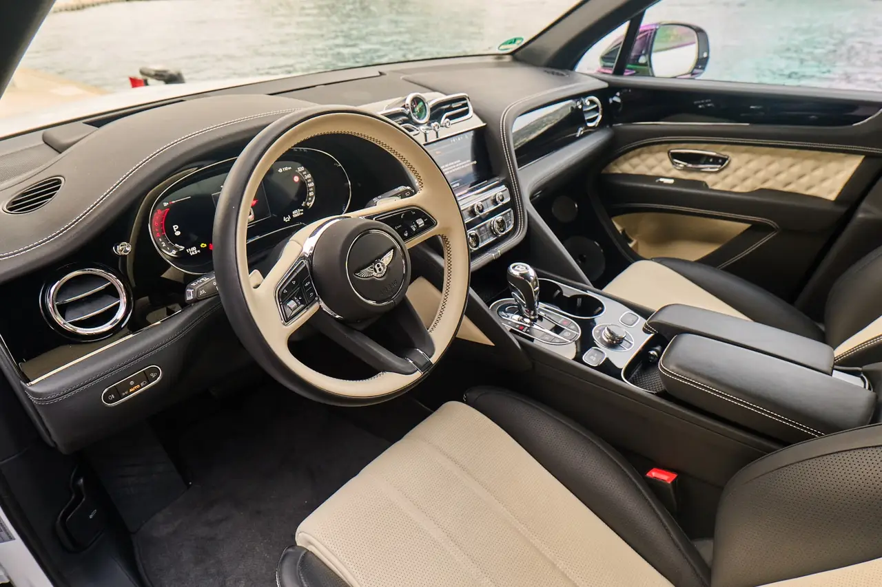 Bentley Bentayga V8-S 2024, rear view — Veyra Cars, Europe. The Bentayga V8-S pairs a 550 hp V8 with the full-size body and seating for five that…