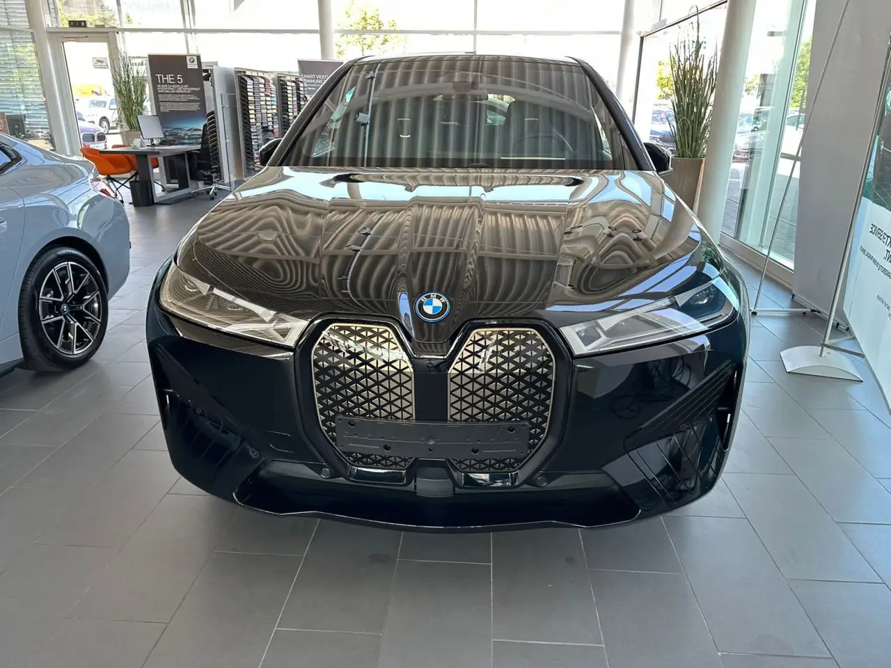 BMW IX M60 2023, front view — Veyra Cars, Europe. The BMW iX M60 pairs 619 hp with an electric drivetrain, which shows up most clearly in…