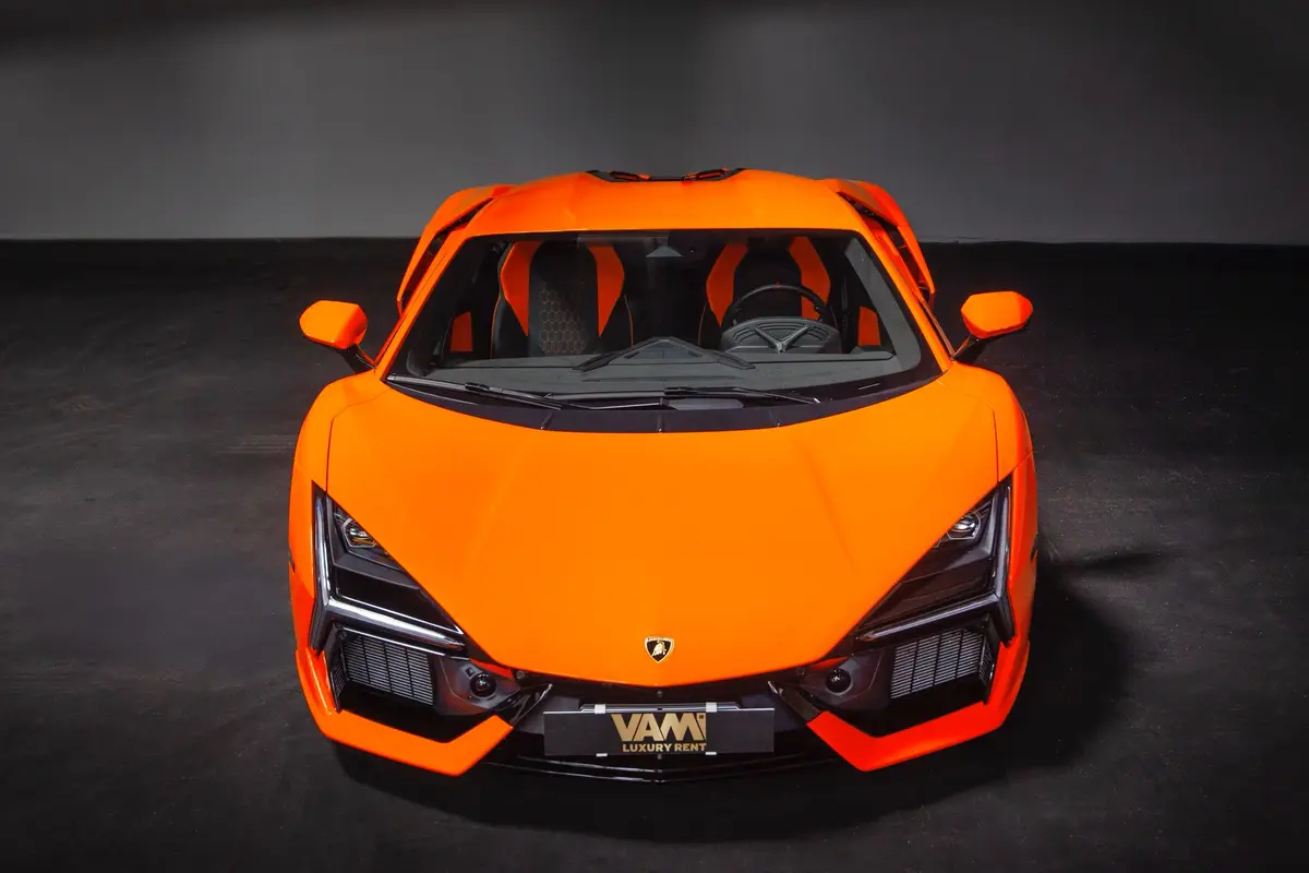 Lamborghini Revuelto 2026, rear view — Veyra Cars, Europe. The Lamborghini Revuelto sits at the top of Veyra Cars' fleet for a reason: 1015 hp…