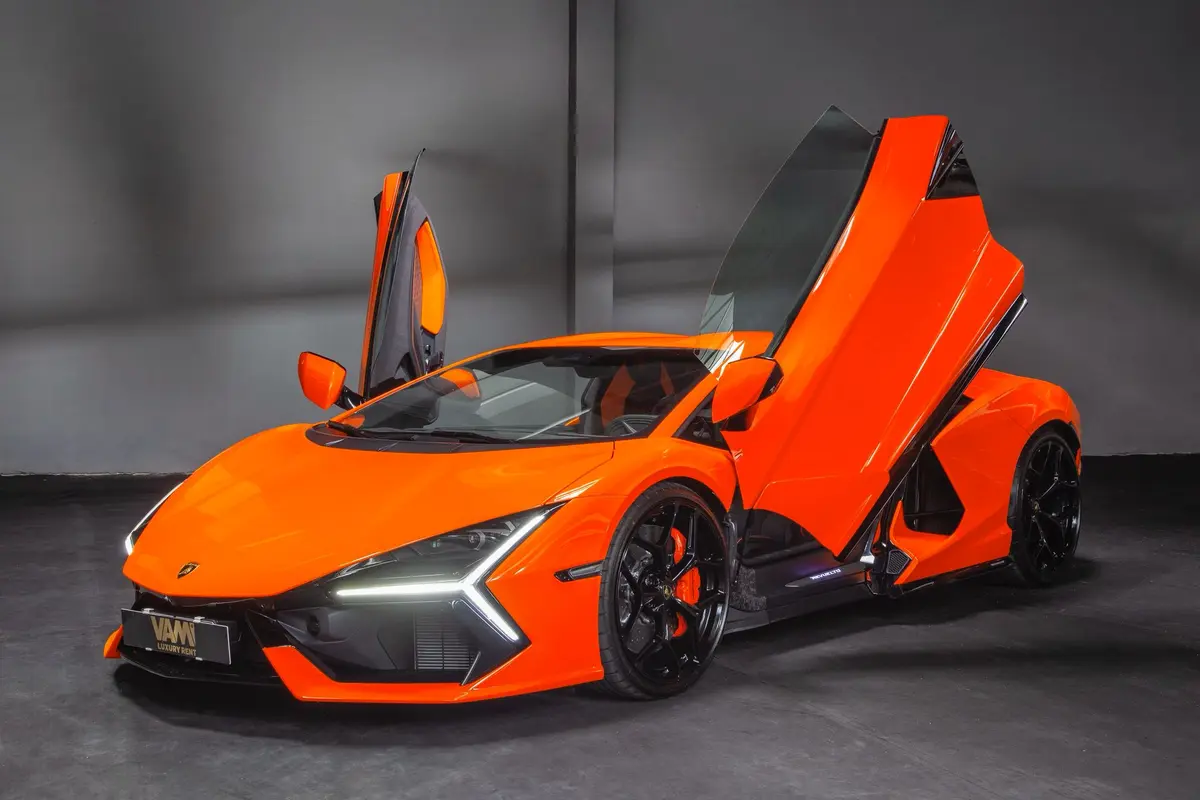 Lamborghini Revuelto 2026, side profile — Veyra Cars, Europe. The Lamborghini Revuelto sits at the top of Veyra Cars' fleet for a reason: 1015 hp…