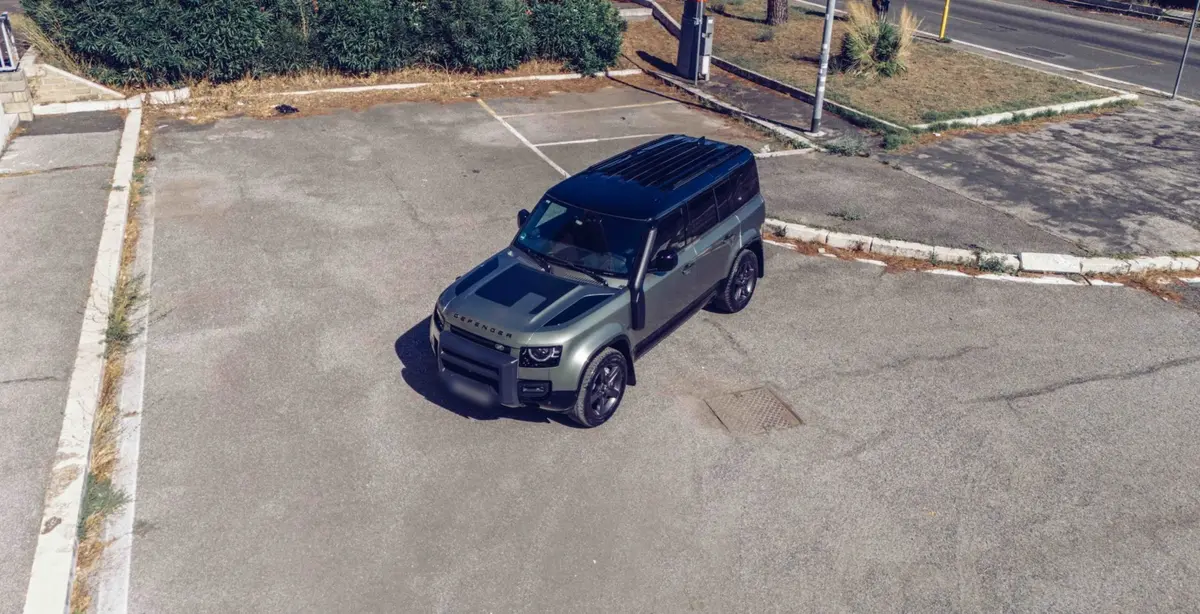 Land Rover Defender X-Dynamic 7 seater 2024, rear view — Veyra Cars, Europe. The 2024 Land Rover Defender X-Dynamic seats seven and carries its 300 hp with the…