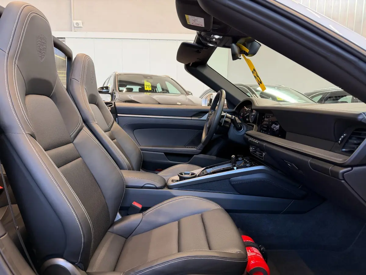 Porsche 911 Carrera S Cabrio (992) 2025, exterior — Veyra Cars, Europe. The 2025 Porsche 911 Carrera S Cabrio (992) carries 480 hp through a chassis that has…