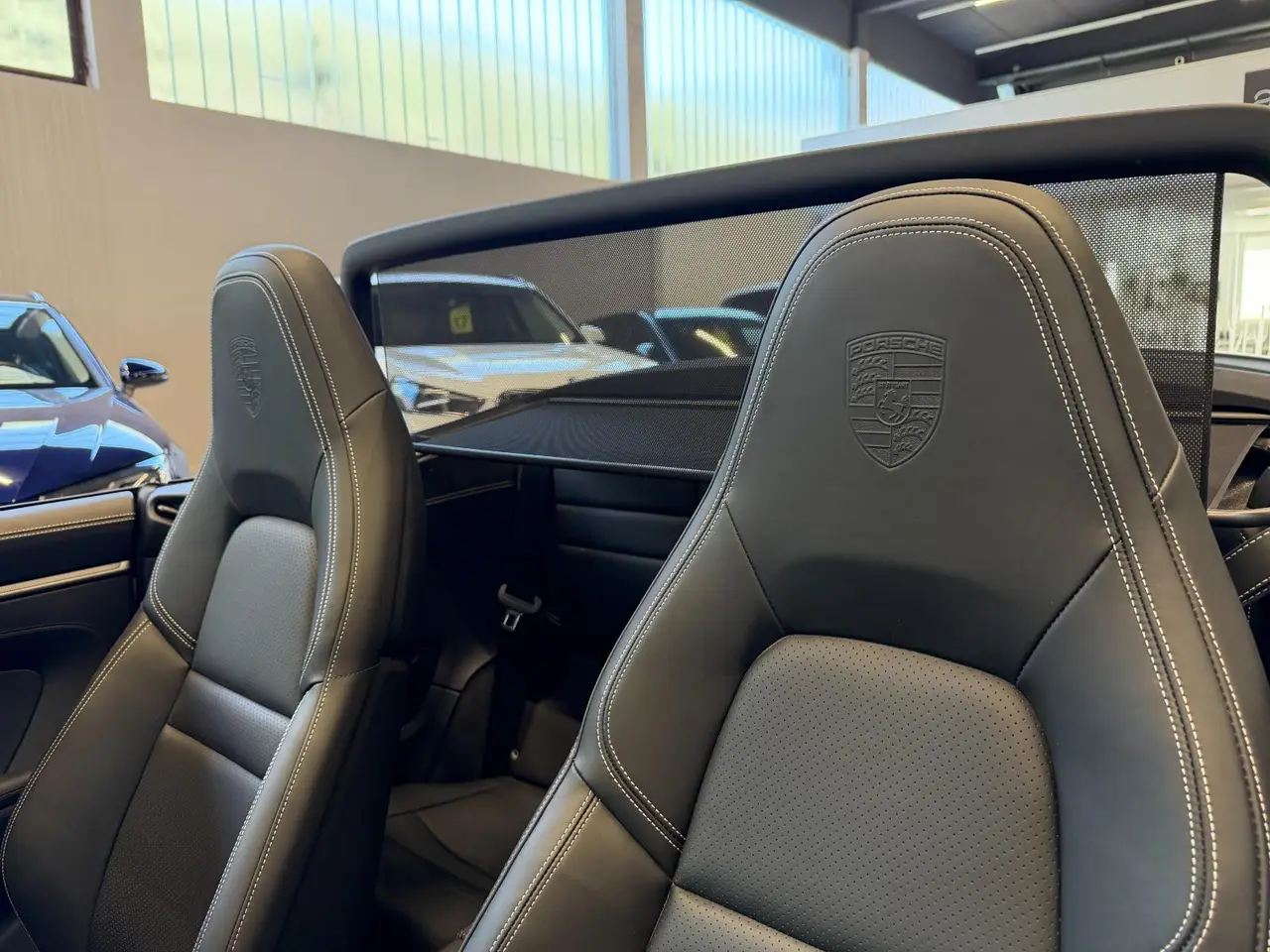 Porsche 911 Carrera S Cabrio (992) 2025, rear view — Veyra Cars, Europe. The 2025 Porsche 911 Carrera S Cabrio (992) carries 480 hp through a chassis that has…