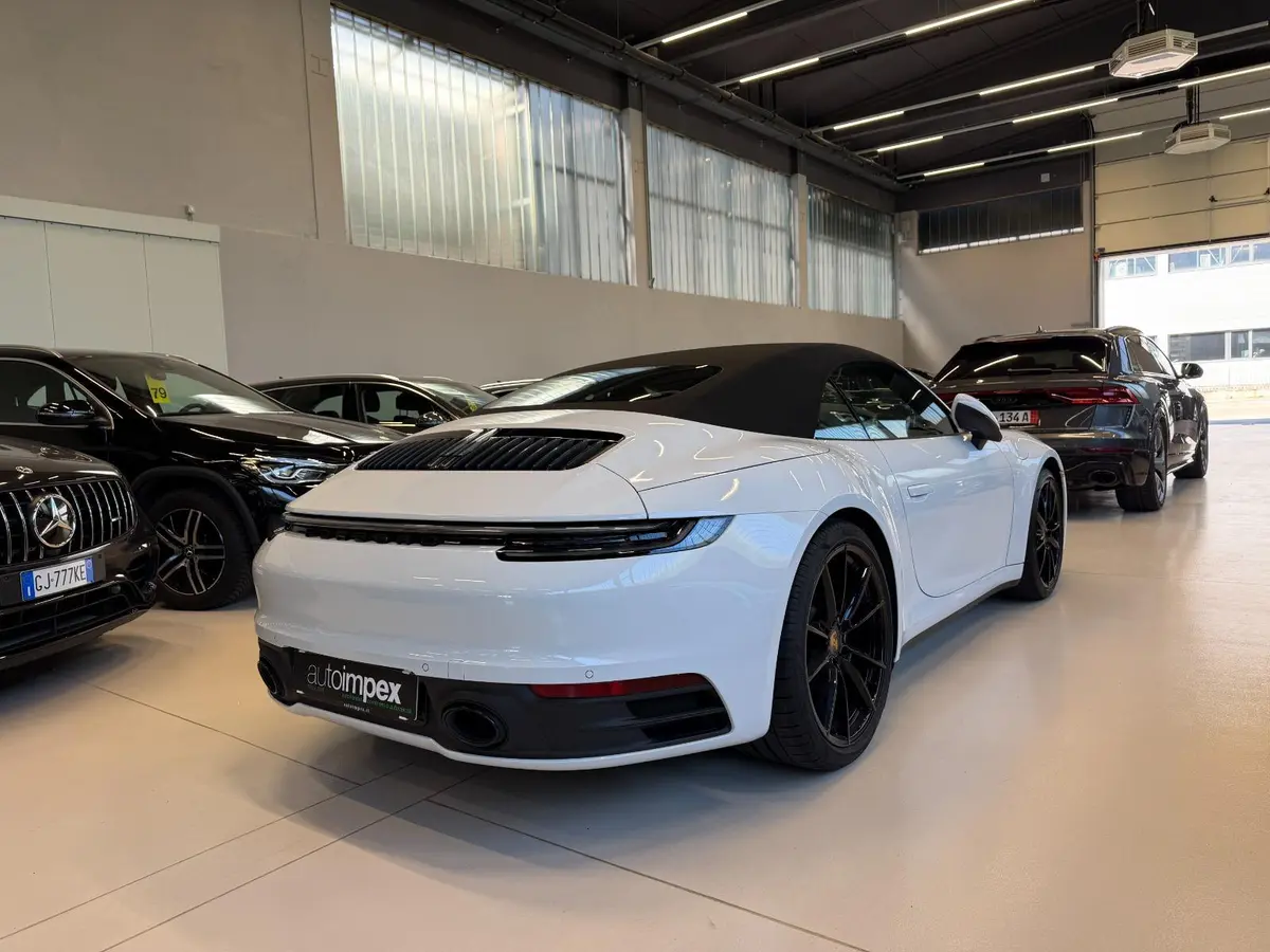 Porsche 911 Carrera S Cabrio (992) 2025, side profile — Veyra Cars, Europe. The 2025 Porsche 911 Carrera S Cabrio (992) carries 480 hp through a chassis that has…