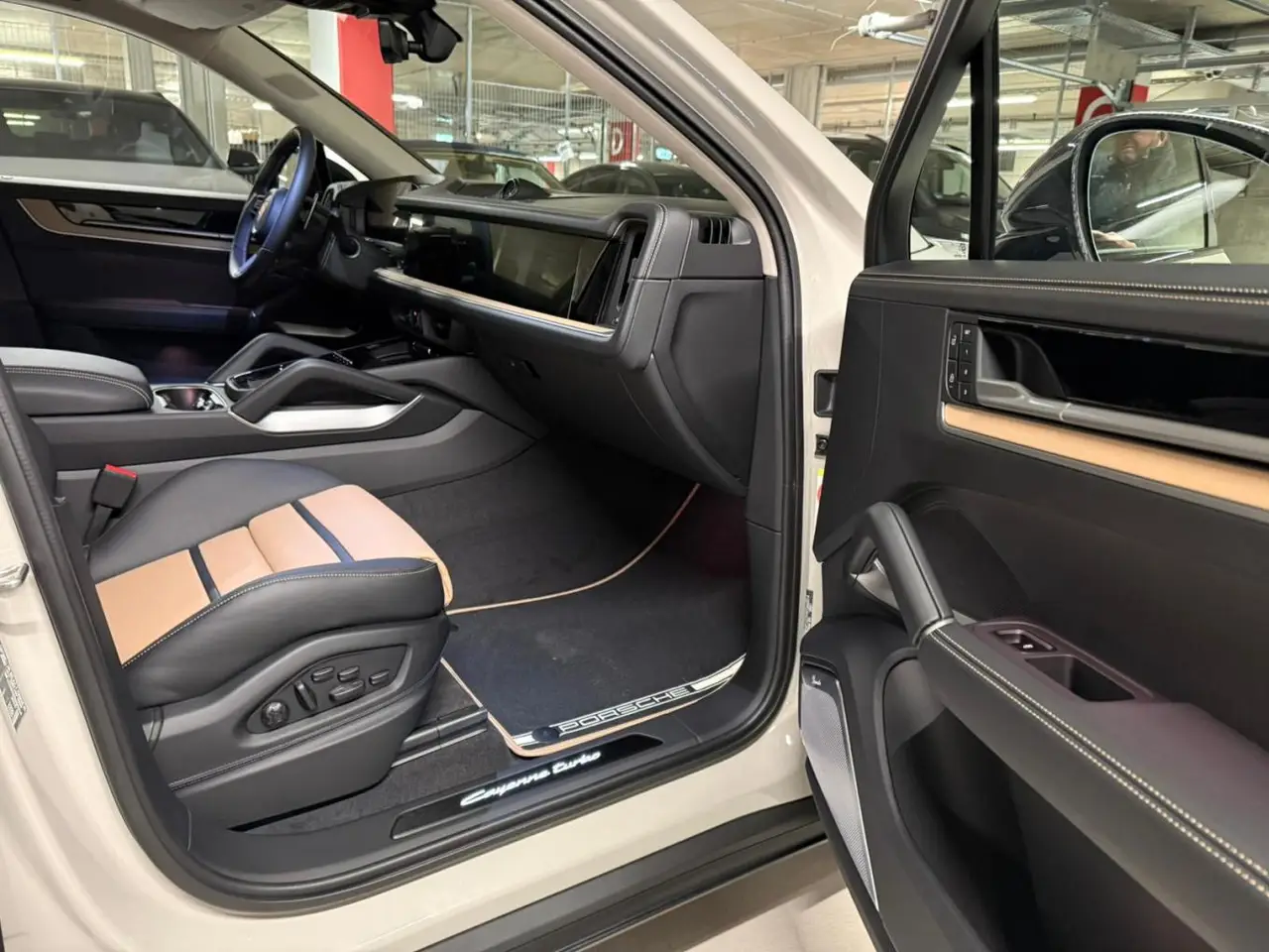 Porsche Cayenne Turbo E-Hybrid Coupé GT 2026, rear view — Veyra Cars, Europe. The 2026 Porsche Cayenne Turbo E-Hybrid Coupé GT pairs a coupé-profiled SUV body with a…